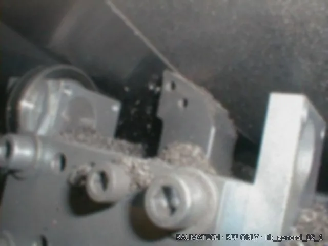 Grinding head and swarf detail