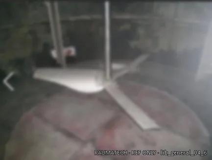 Agitator blades in tank